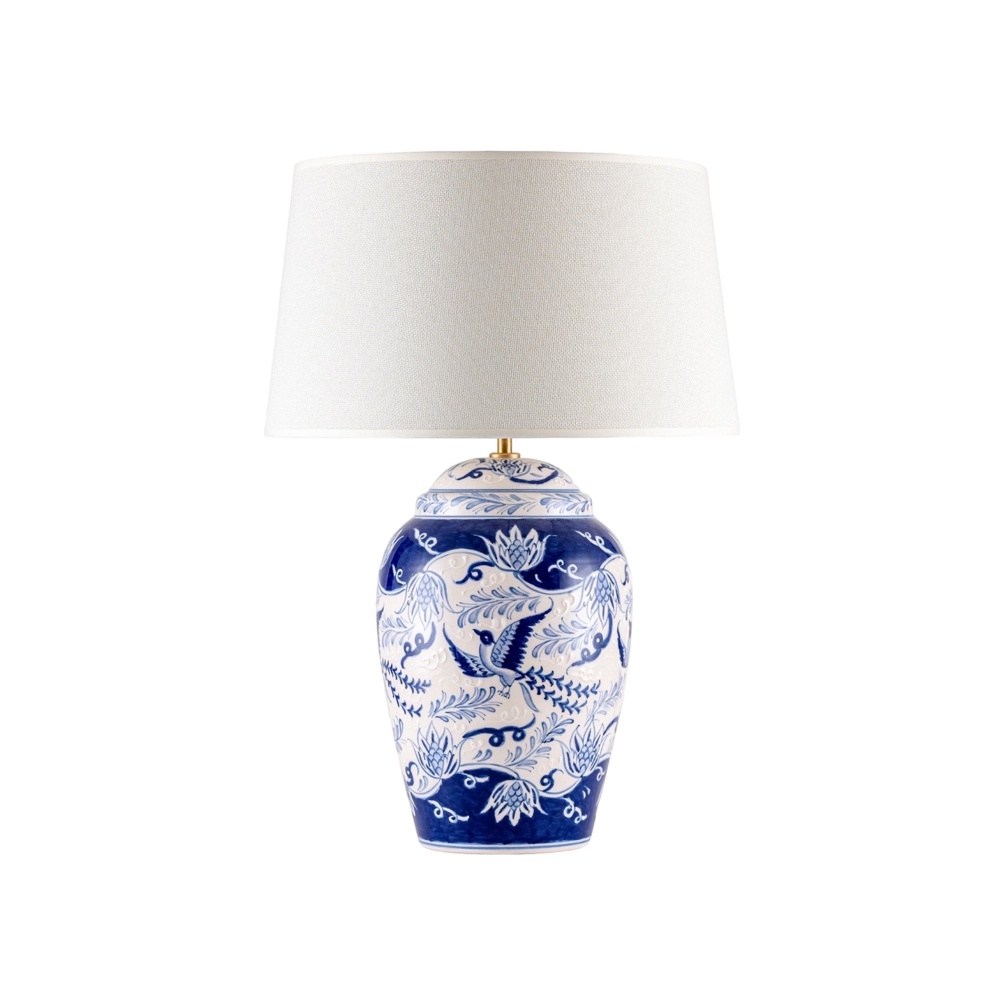 Bascuda Mythical Woodpecker ceramic table lamp with blue and white floral and bird motif. White linen drum shade.