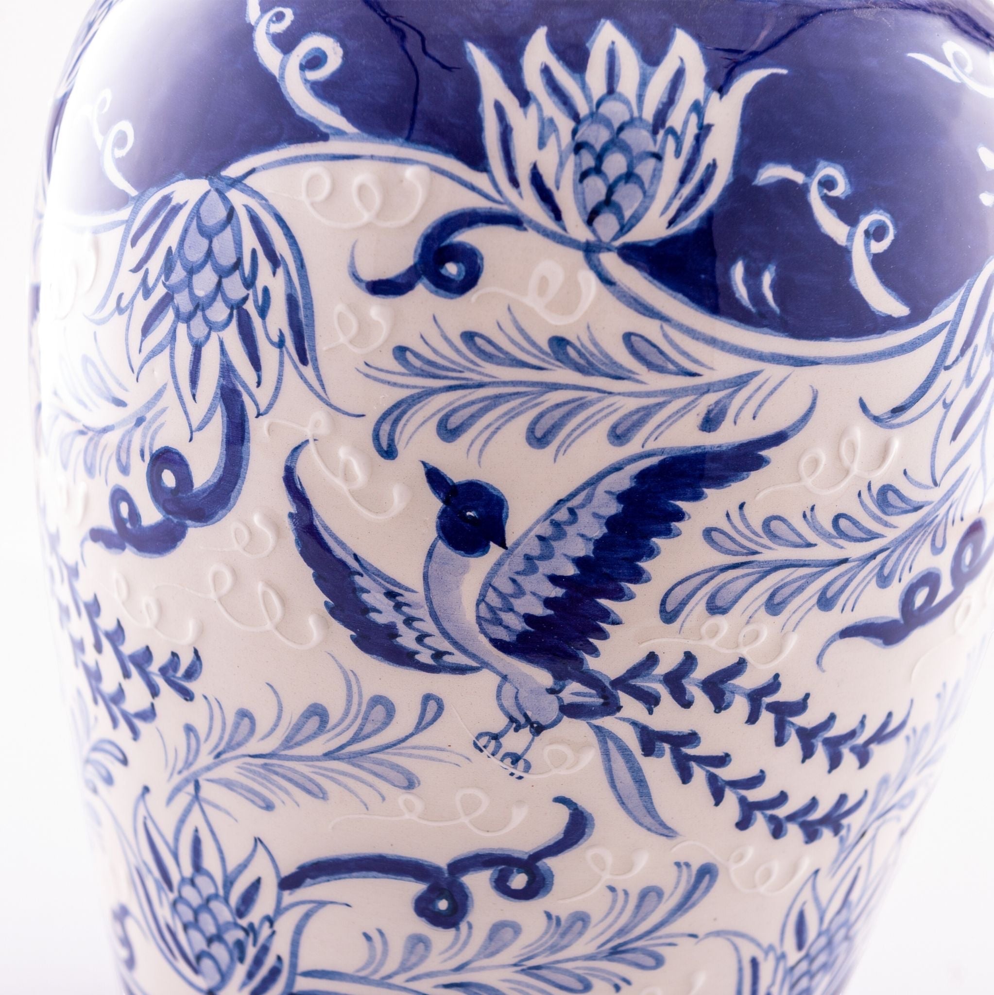 Bascuda Mythical Woodpecker ceramic lamp with blue floral motifs and embossed details.